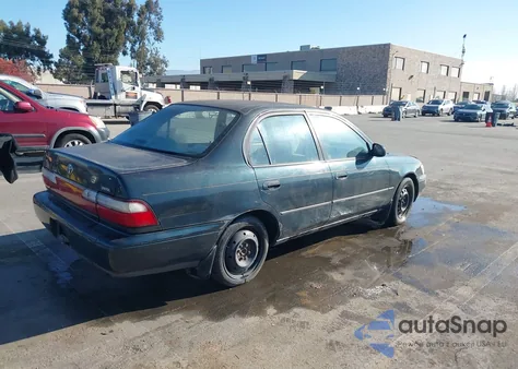 1997 Toyota Corolla Dx z USA, uszkodzony, nr VIN 1NXBB02E2VZ553840